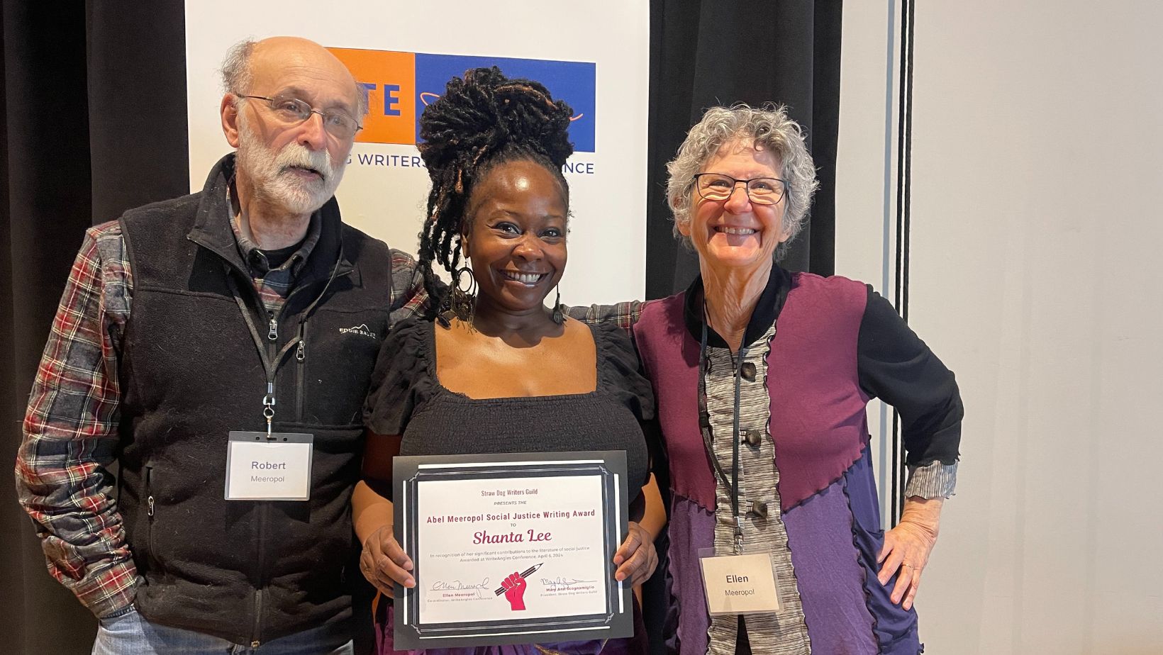 WriteAngles 2024 - LtoR - Robert Meeropol, Shanta Lee and Ellen Meeropol pose for photos after Lee was awarded the Abel Meeropol Social Justice Writing Award