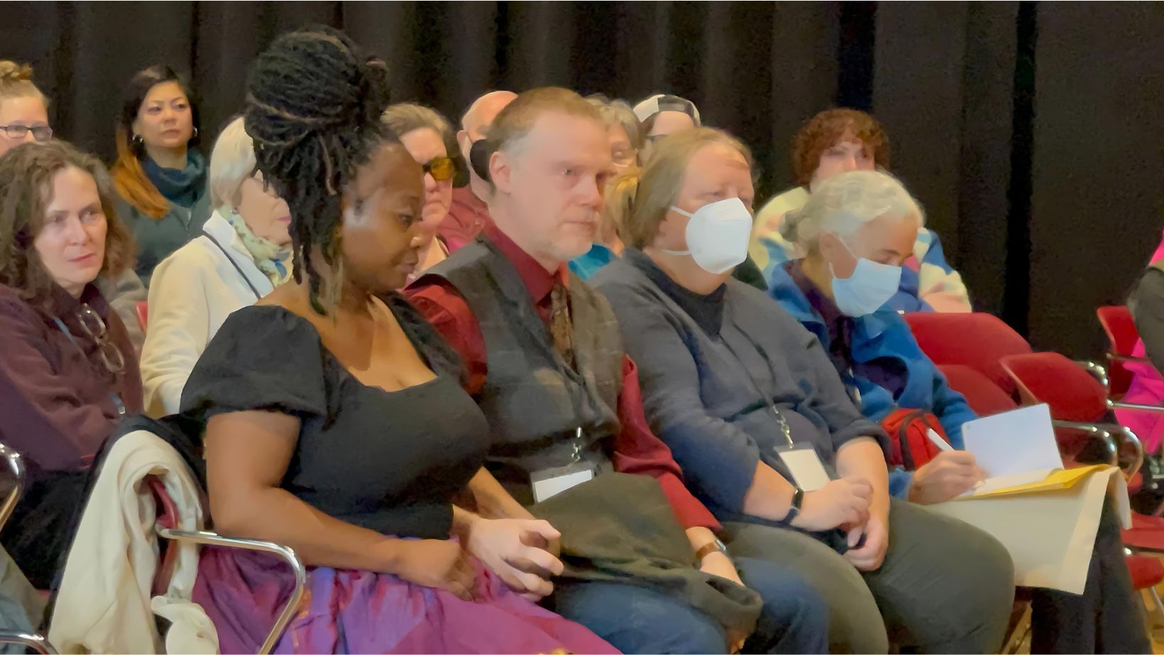 WriteAngles 2024 - Shanta Lee and her partner seated in the front row before the keynote speech